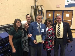 Chris Wenzler at his John Carroll HOF ceremony with family L-R: Madeline (daughter), Susan (his mom), Oliver (son), Chris, Melissa (wife), and Marty (father).